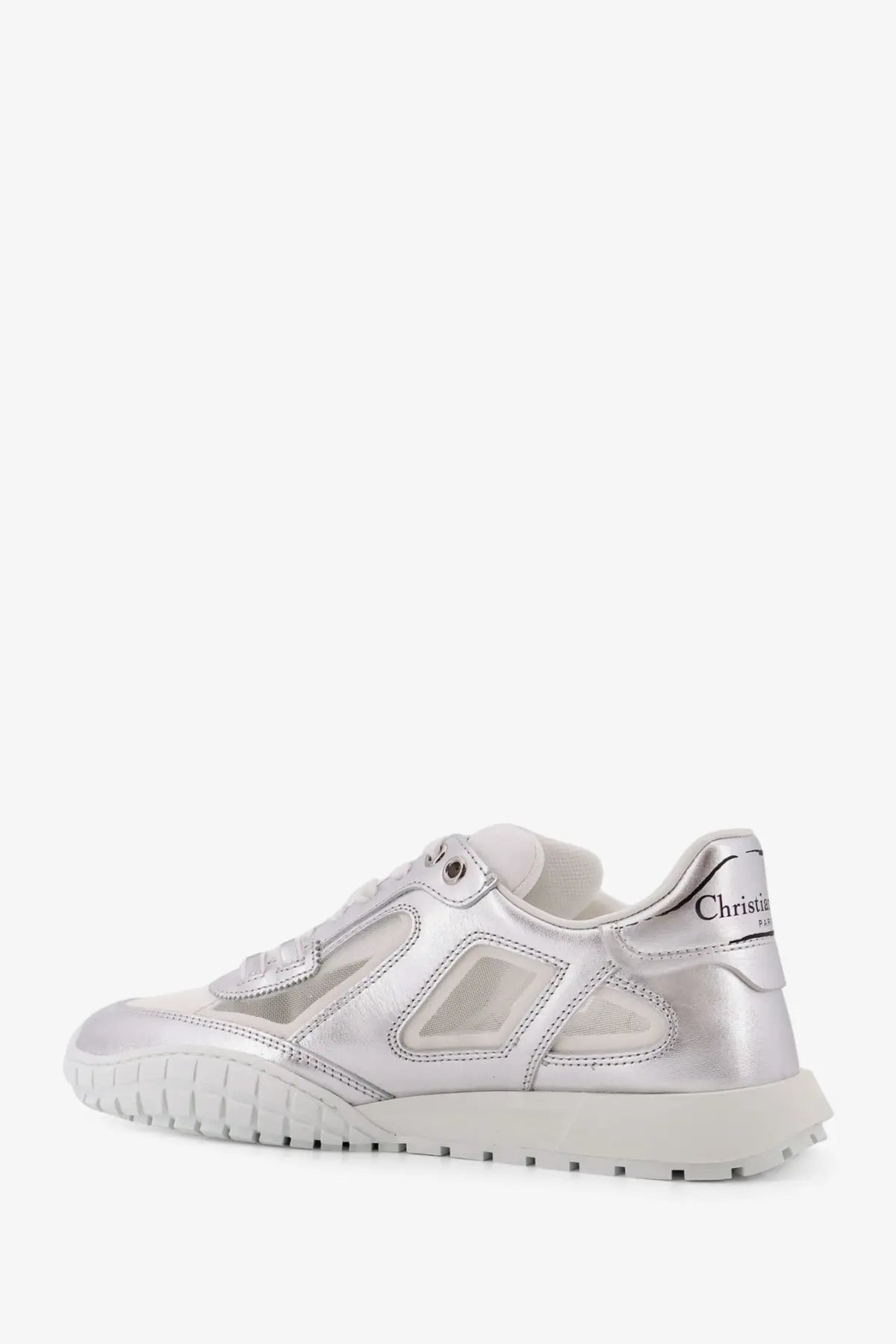 Dior women’s laminated leather silver sneaker with transparent mesh panels and white rubber sole