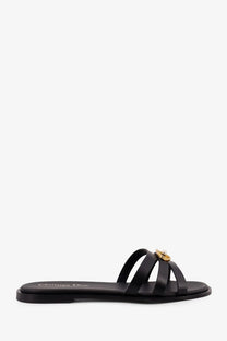 Black leather Christian Dior slide sandal with gold-tone hardware and pearl accent for women