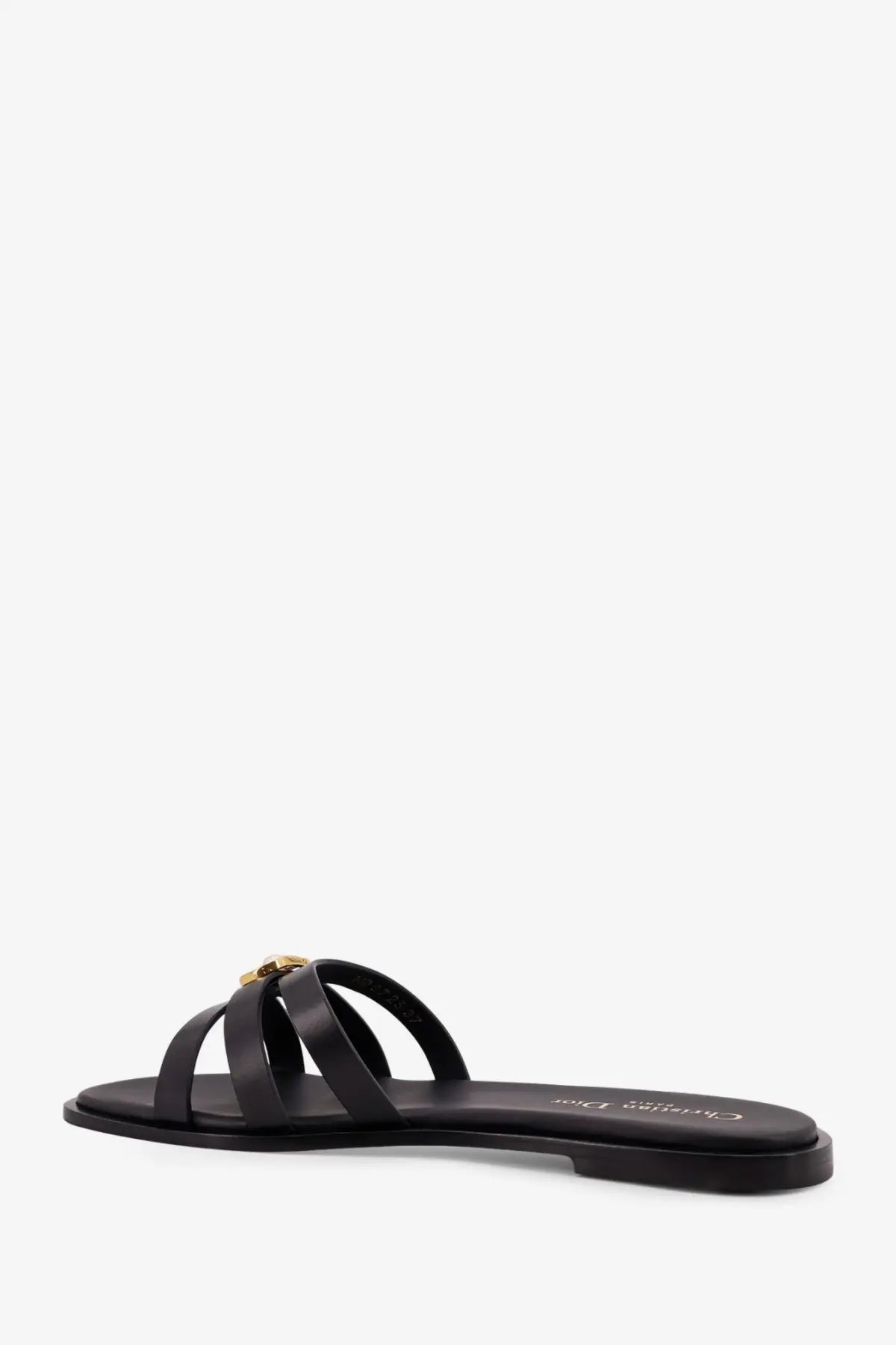 Dior women’s black leather slide sandal featuring gold-tone hardware for stylish casual wear
