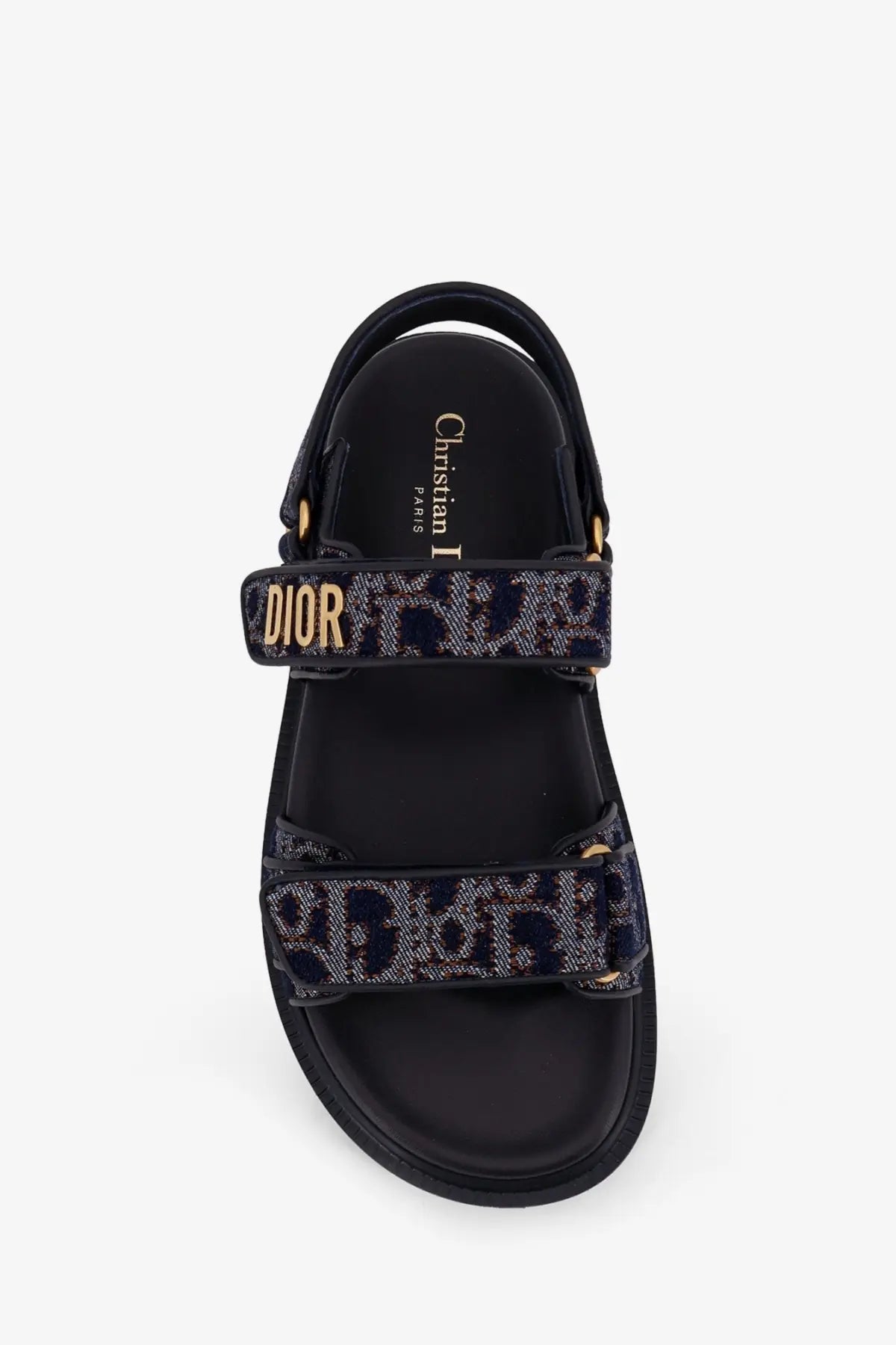 Black dior christian i sandals with textured patterned strap gold-tone branding and metallic hardware