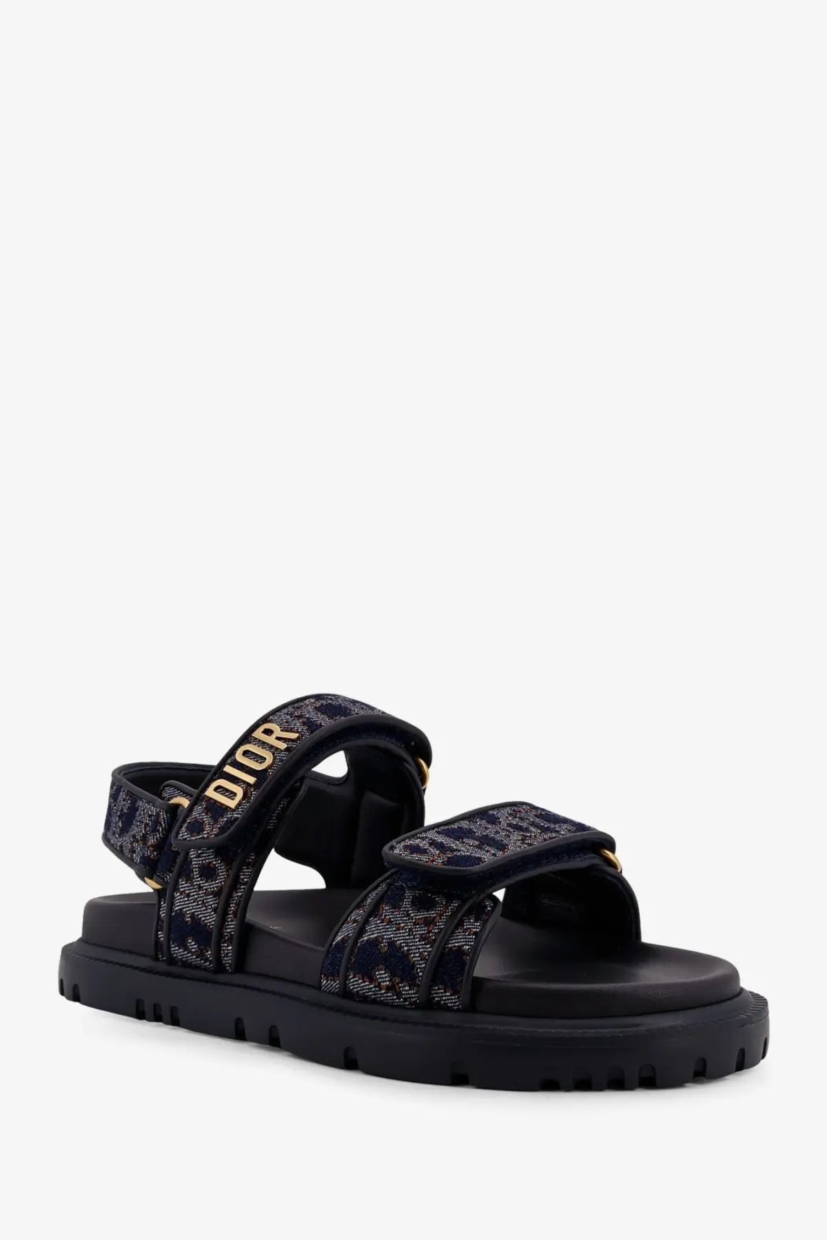 Black dior sandals with textured pattern and gold-tone branding on straps for womens dior oblique denim dioract sandals blue
