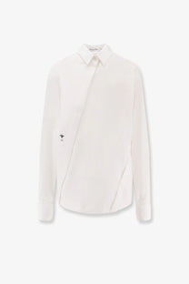 Dior women’s white shirt with asymmetrical design and subtle black embroidery on the left sleeve