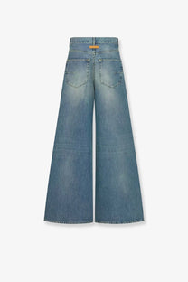 Back view of dior women’s stone washed light-wash denim wide-leg jeans with classic pockets and subtle brand tag