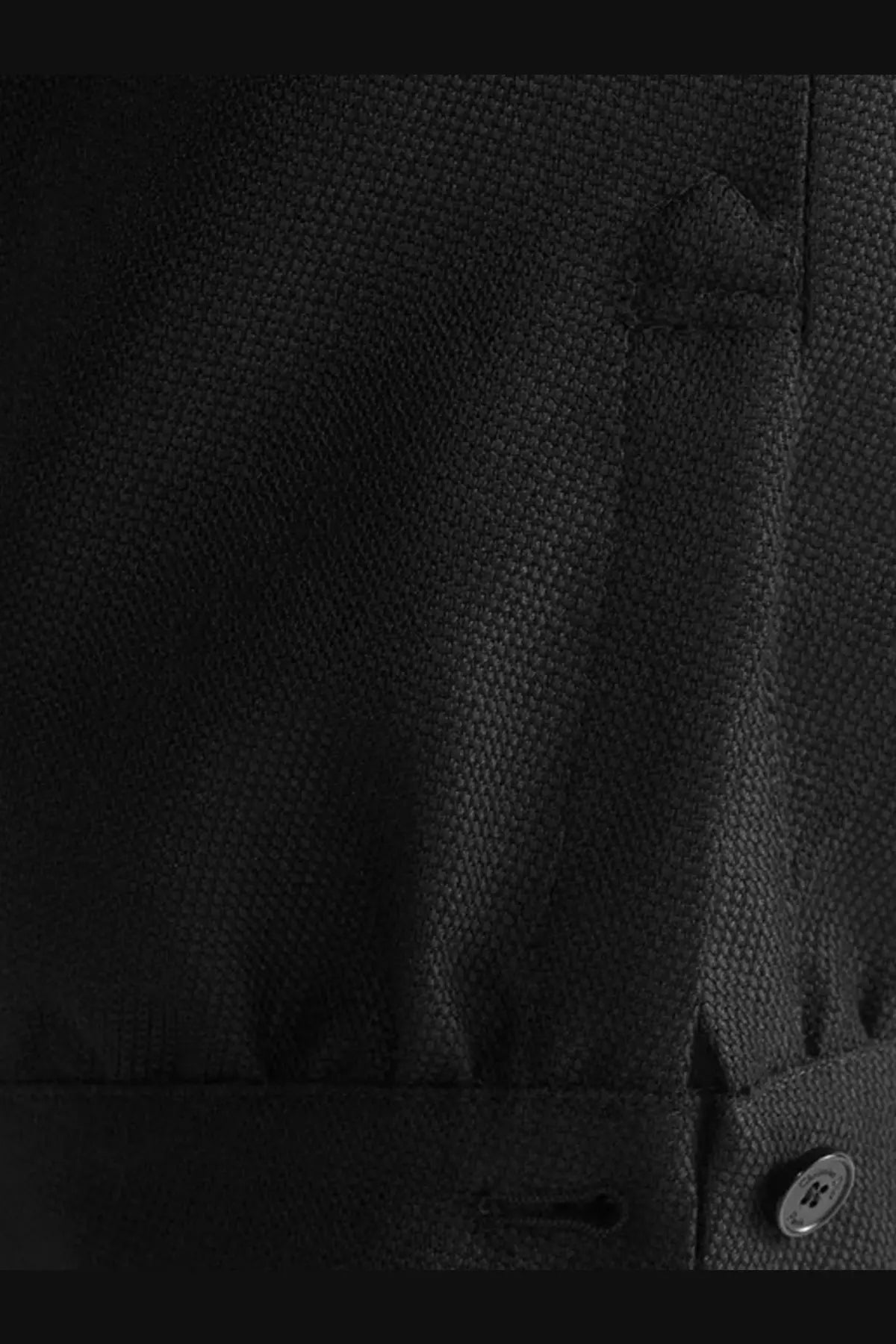 Black textured fabric shirt with subtle weave pattern and single cuff button paired with dior bermuda shorts