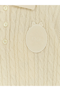 Dior women’s cream-colored cable-knit wool and cotton blend polo sweater with embroidered logo patch and white buttons