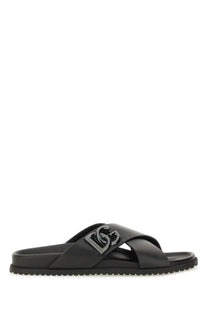 Dolce &amp; Gabbana men’s black calfskin slide sandal with metallic dg logo buckle on top
