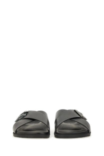 Dolce &amp; gabbana men’s calfskin black leather slide sandals with cross-strap design and metallic buckle accents