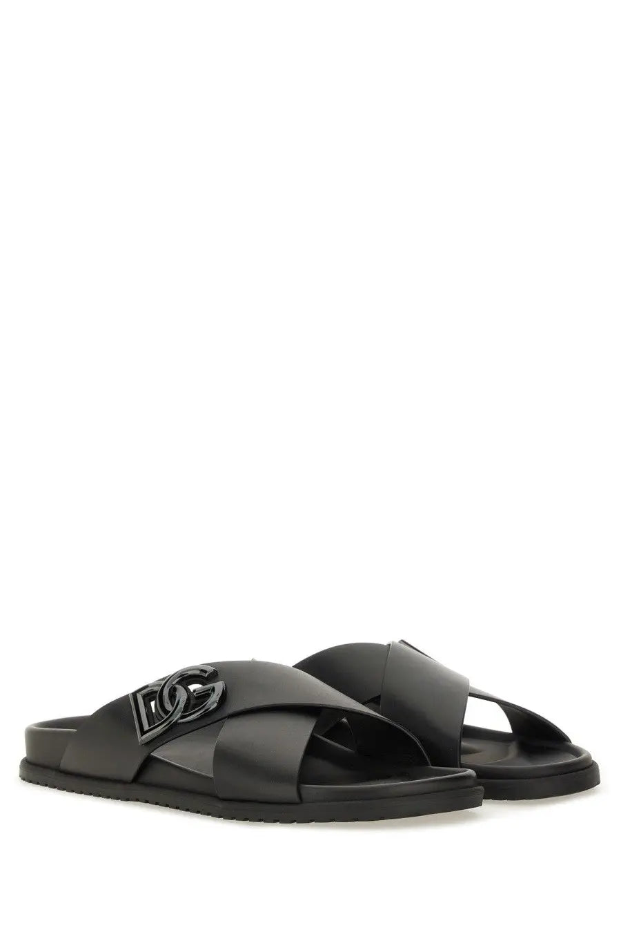 Dolce &amp; Gabbana men’s black calfskin leather slide sandals with a prominent metallic DG logo buckle