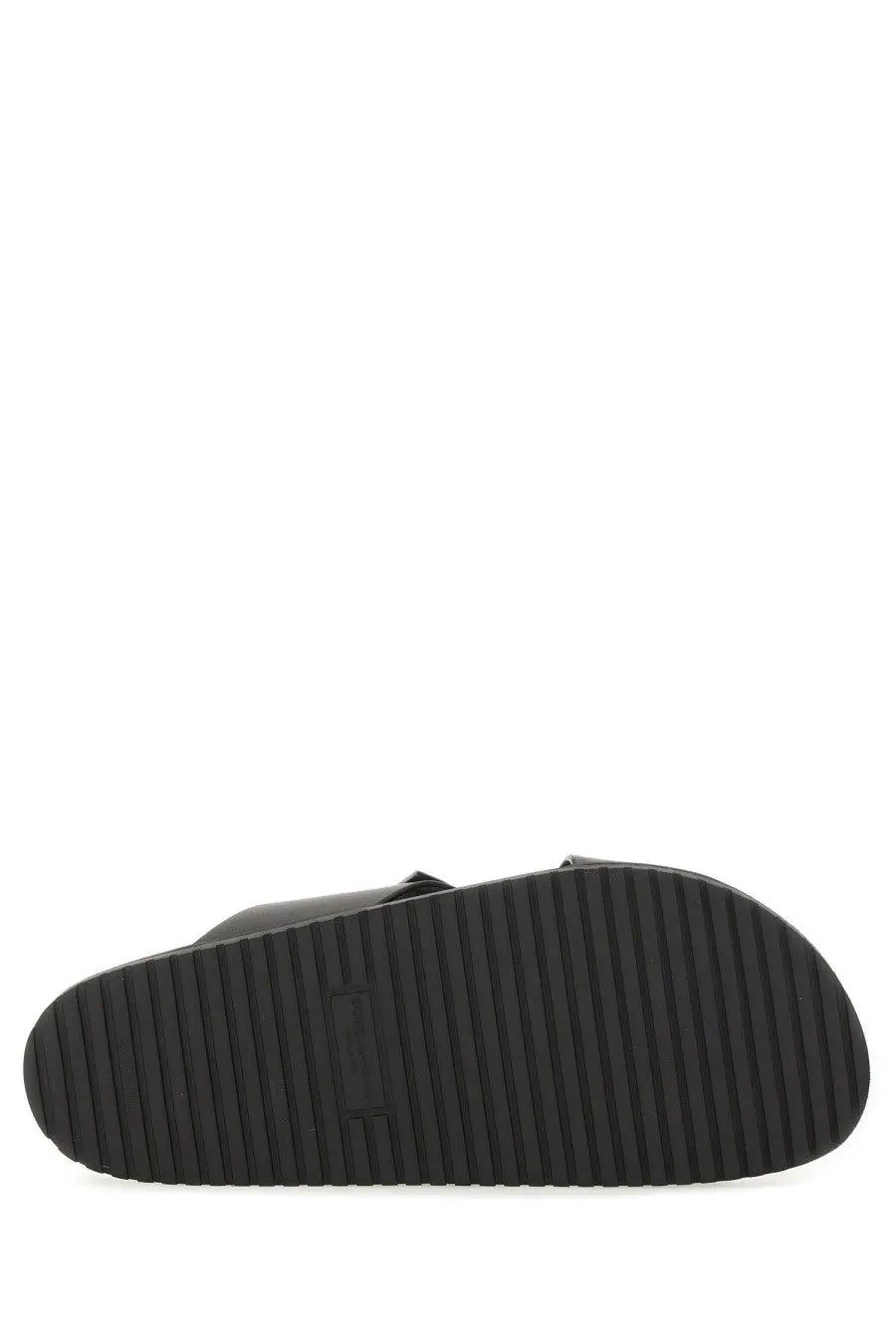 Black rubber sole with textured ribbed pattern on the back side of dolce and gabbana men’s calfskin sandal black