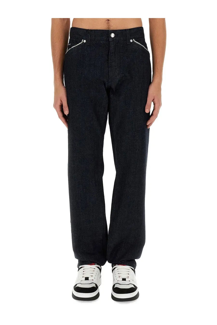 Dolce &amp; Gabbana men’s black denim jeans with white side stitching and button closure in Cimosed style