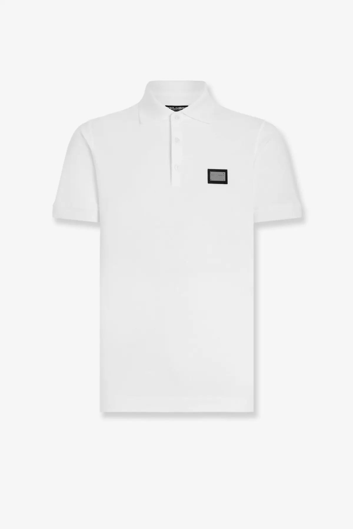 Dolce &amp; Gabbana men’s white cotton polo shirt with black rectangular patch on left chest and small collar tag