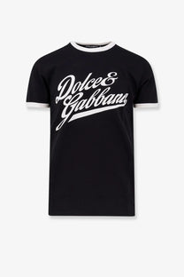 Dolce &amp; Gabbana men’s black cotton ringer t-shirt with white lettering and trim features a classic fit