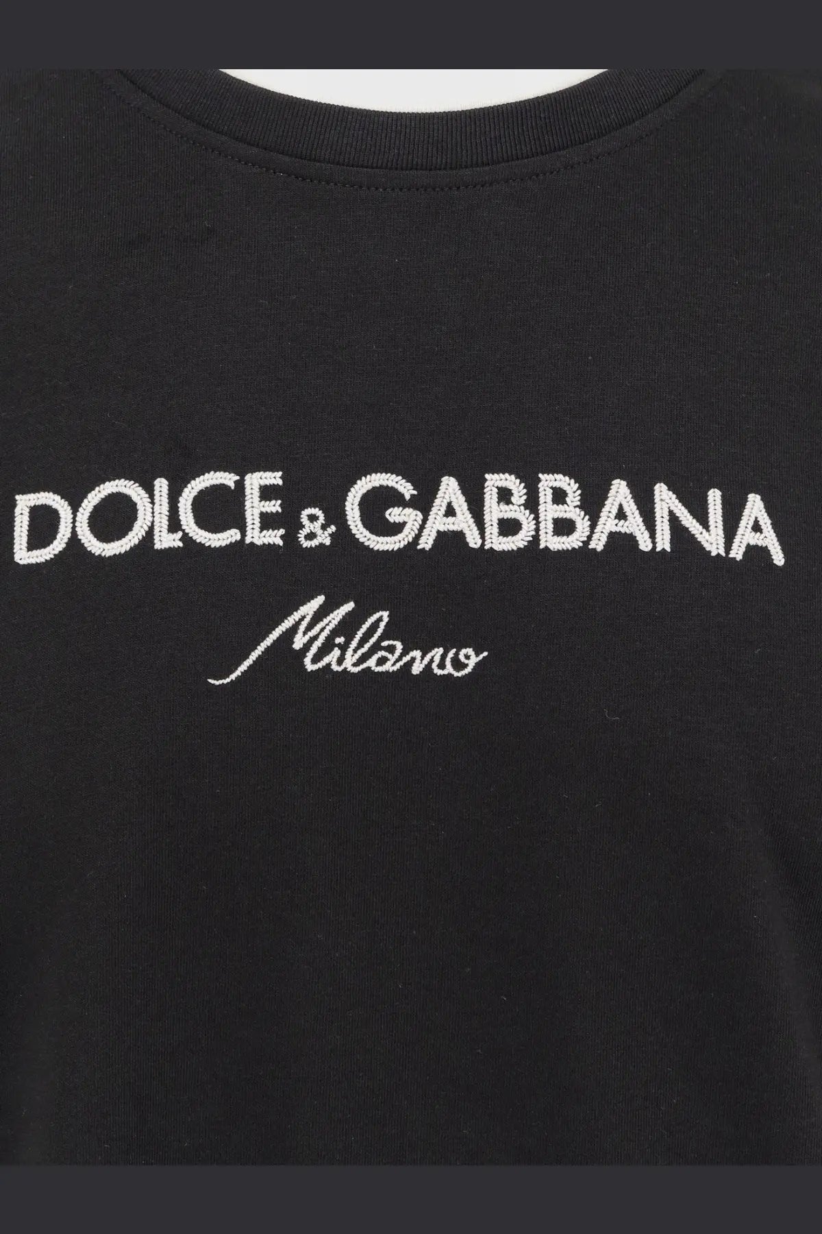 Black dolce and gabbana men’s cotton t-shirt with white embroidered logo and cursive milano script on the front