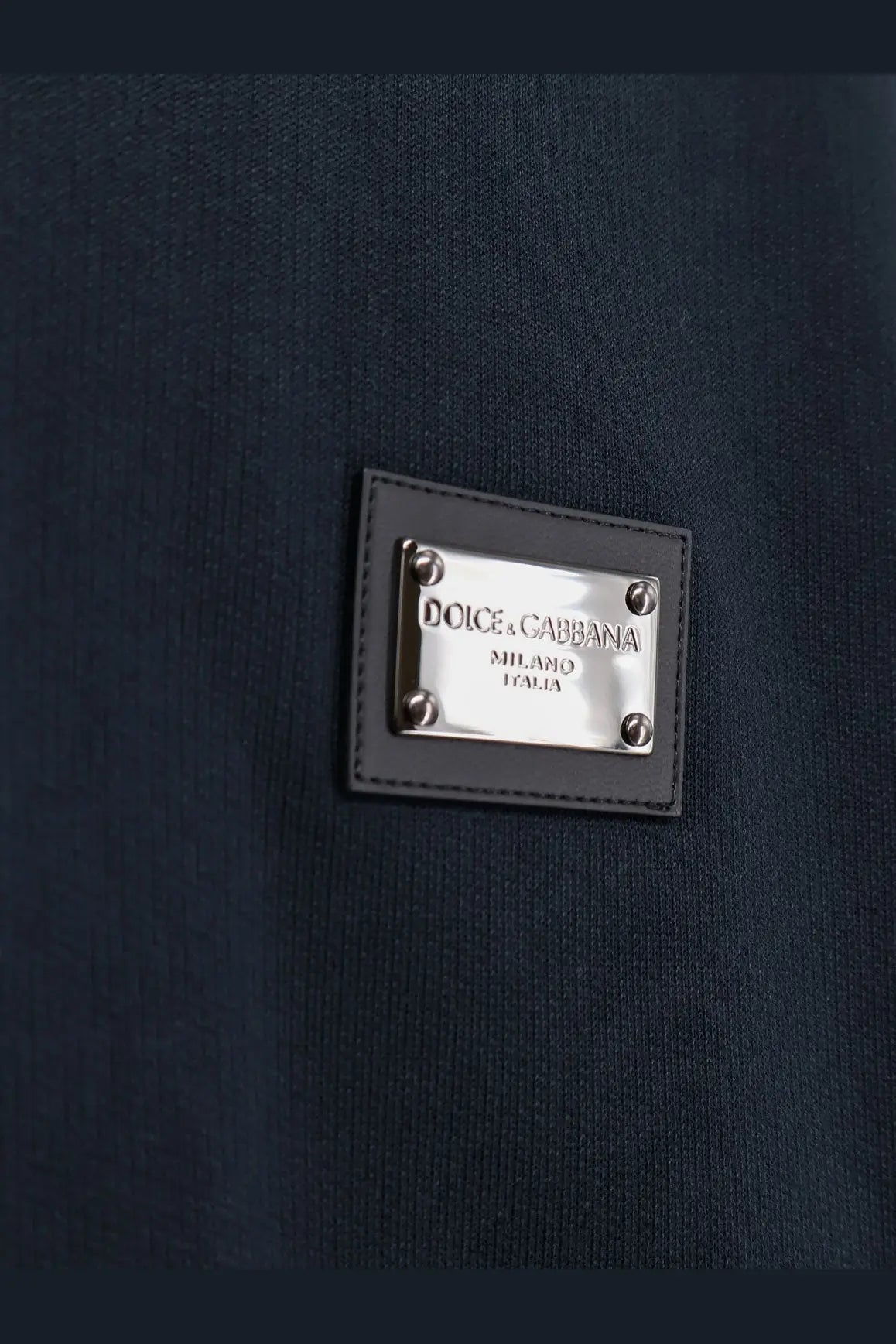 Dolce and gabbana men’s grey cotton sweatshirt with dark navy blue branded patch and silver metal plaque on black leather border