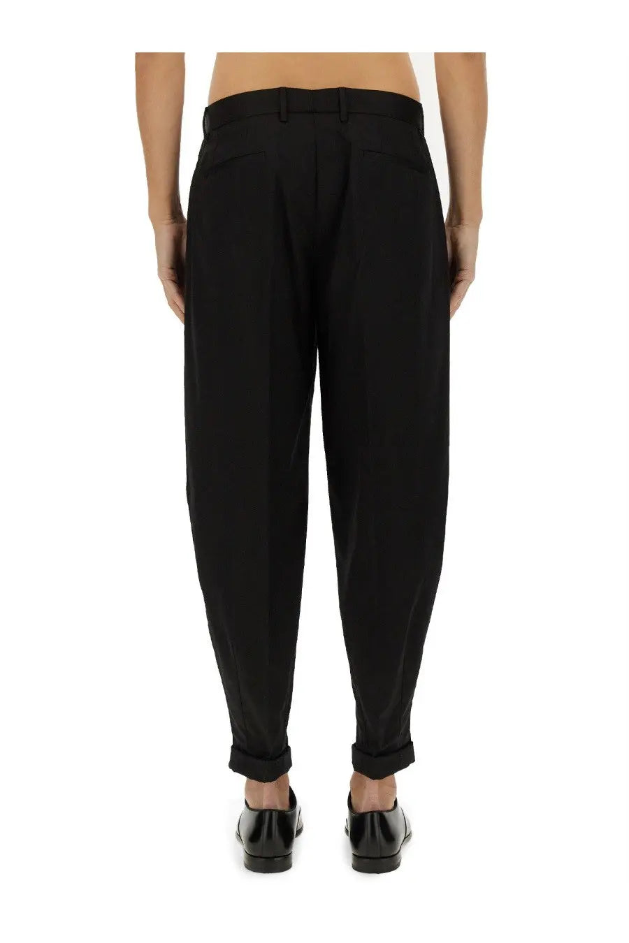 Dolce &amp; Gabbana men’s black tapered trousers with sleek modern cut and subtle pleats at the waist