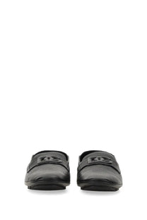 Dolce &amp; Gabbana men’s black leather driver loafers with textured surface and prominent interlocking logo emblem on vamp