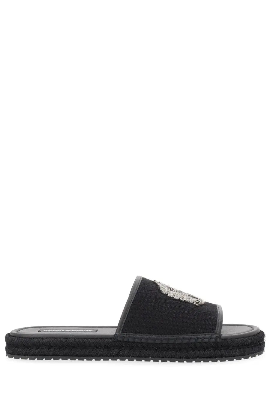Dolce &amp; Gabbana men’s espadrille black slide sandal with woven sole and silver embroidered lion emblem on strap