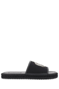 Dolce &amp; Gabbana men’s espadrille black slide sandal with woven sole and silver embroidered lion emblem on strap