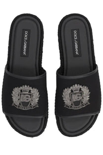 Dolce &amp; Gabbana men’s espadrille black slide sandals with silver embroidered crest logo on the strap