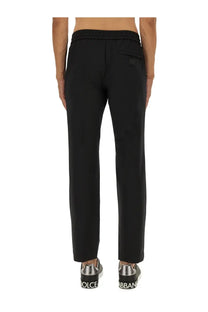 Dolce &amp; Gabbana men’s black tapered jogging pants with drawstring waistband and subtle side pockets