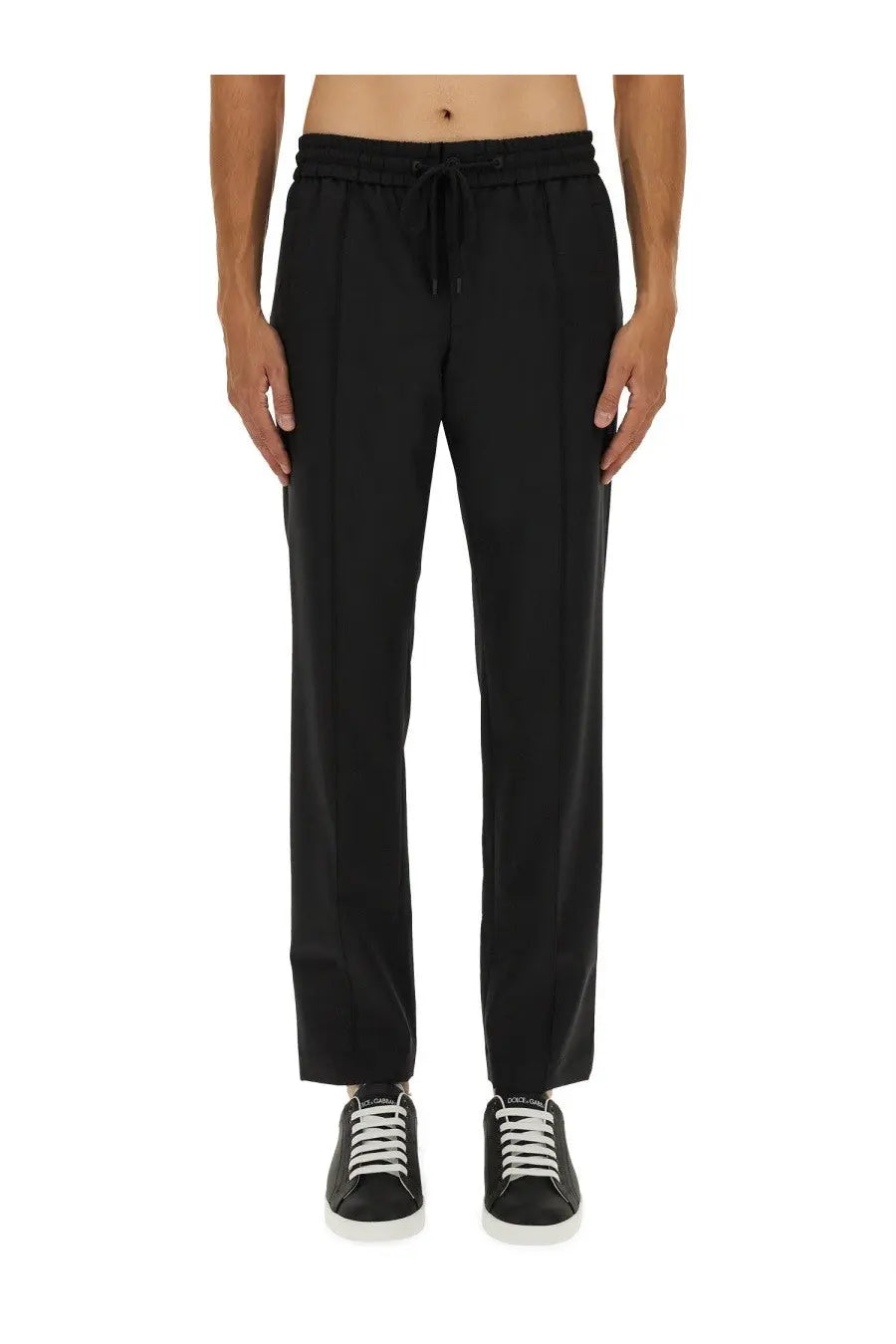 Dolce &amp; Gabbana men’s black drawstring jogging pants with sleek straight-leg cut and subtle front pleats