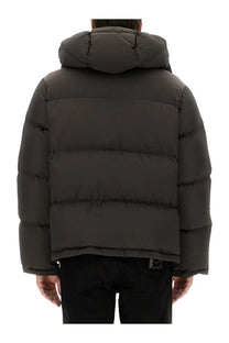 Dolce &amp; Gabbana men’s dark gray quilted puffer jacket with hood and horizontal stitching in padded design