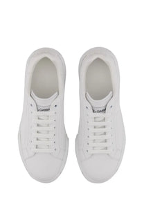 Dolce &amp; Gabbana men’s Portfino white leather sneakers with a clean minimalist design and subtle tongue branding