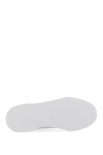 White rubber sole with embossed logo on the back of dolce and gabbana men’s portfino sneaker white