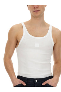 Dolce &amp; Gabbana men’s white ribbed cotton tank top with a small square patch on the chest