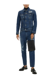 Black karl lagerfeld logo clutch bag in leather paired with dolce &amp; gabbana blue stretch denim jacket for men