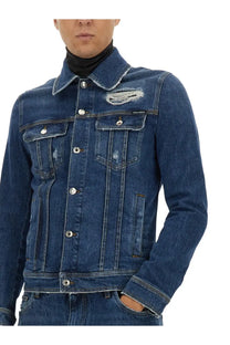 Dolce &amp; Gabbana men’s stretch denim jacket in dark blue with distressed patch on left chest and silver buttons