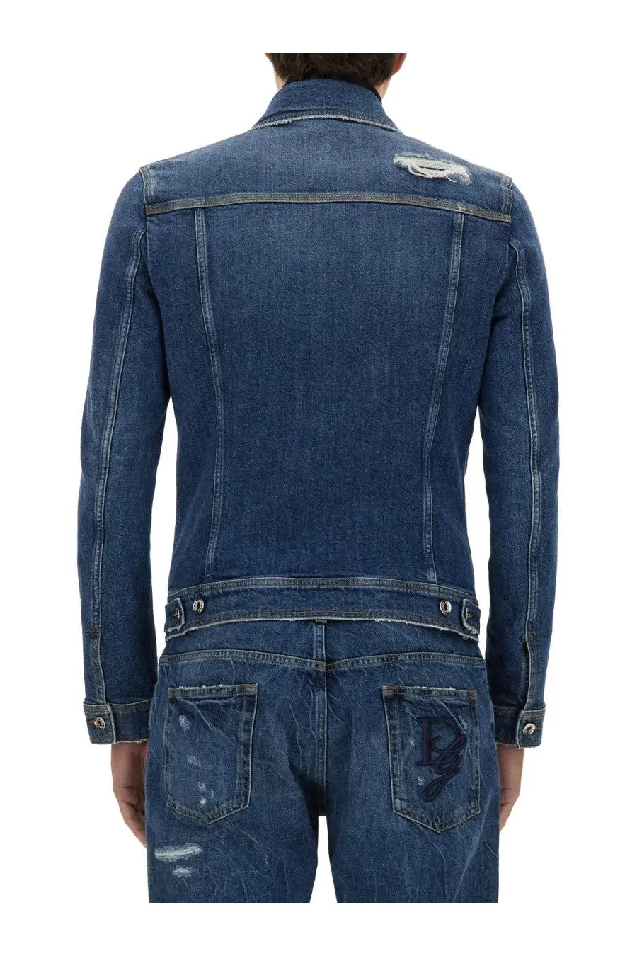 Dark blue dolce &amp; gabbana men’s stretch denim jacket showing distressed details and embroidered logo on back pocket
