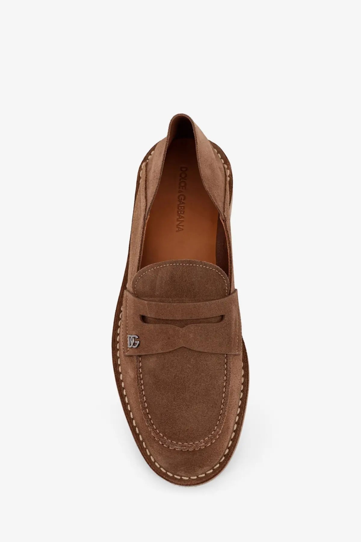 Dolce &amp; Gabbana men’s beige suede slipper loafers with stitched bow detail and metallic logo emblem
