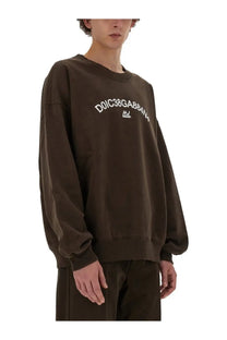 Dolce &amp; Gabbana men’s brown sweatshirt with white embroidered lettering across the chest in cotton material