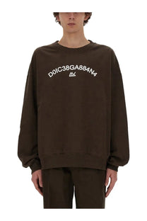 Dolce &amp; Gabbana men’s brown oversized sweatshirt with white arched lettering on the chest