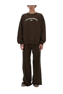 Dolce &amp; Gabbana men’s brown oversized sweatshirt with white embroidered text across the chest in cotton blend