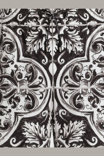 Black and white ornate patterned hoodie with drawstring closure paired with dolce and gabbana men’s swim trunks black