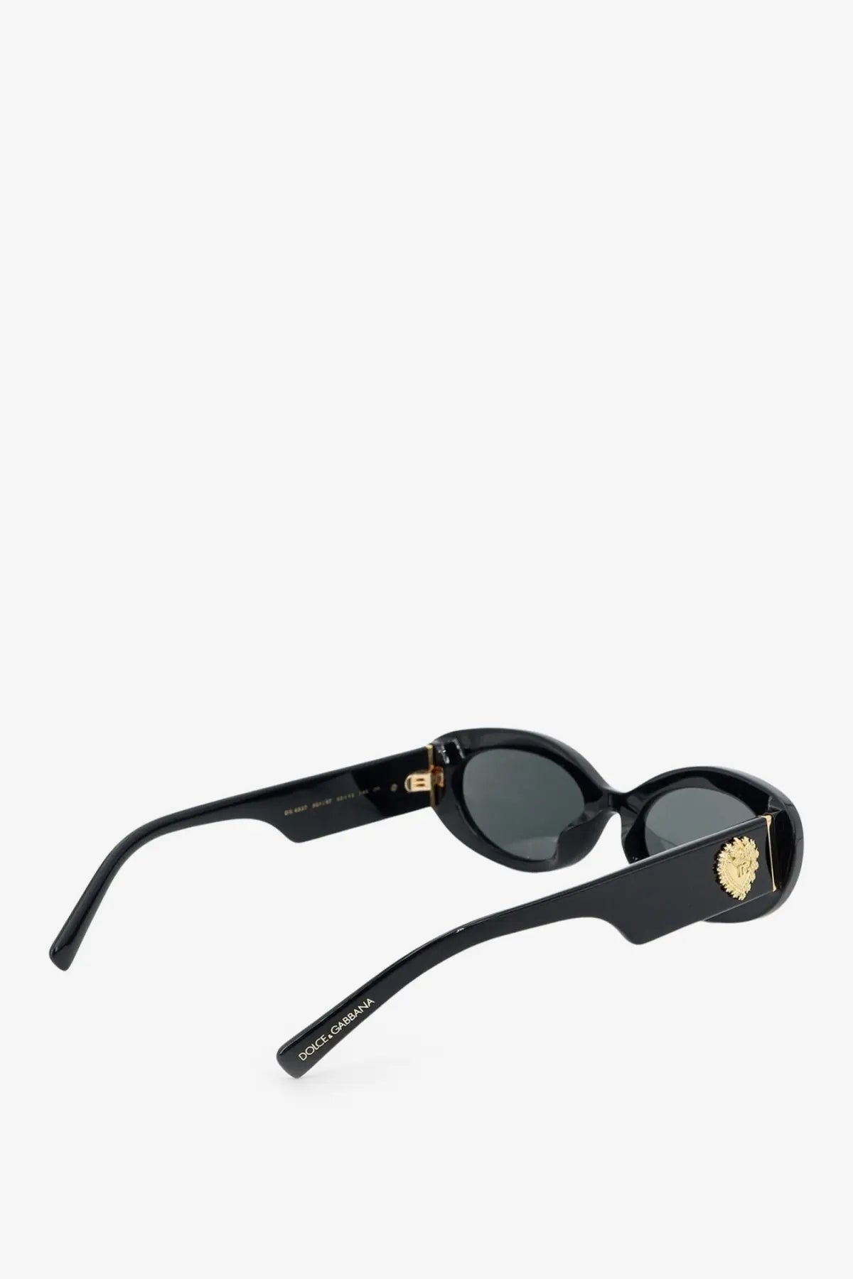 Dolce &amp; gabbana women’s black acetate sunglasses with gold-tone lion head embellishment and dark gray lenses
