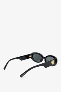 Dolce &amp; gabbana women’s black acetate sunglasses with gold-tone lion head embellishment and dark gray lenses