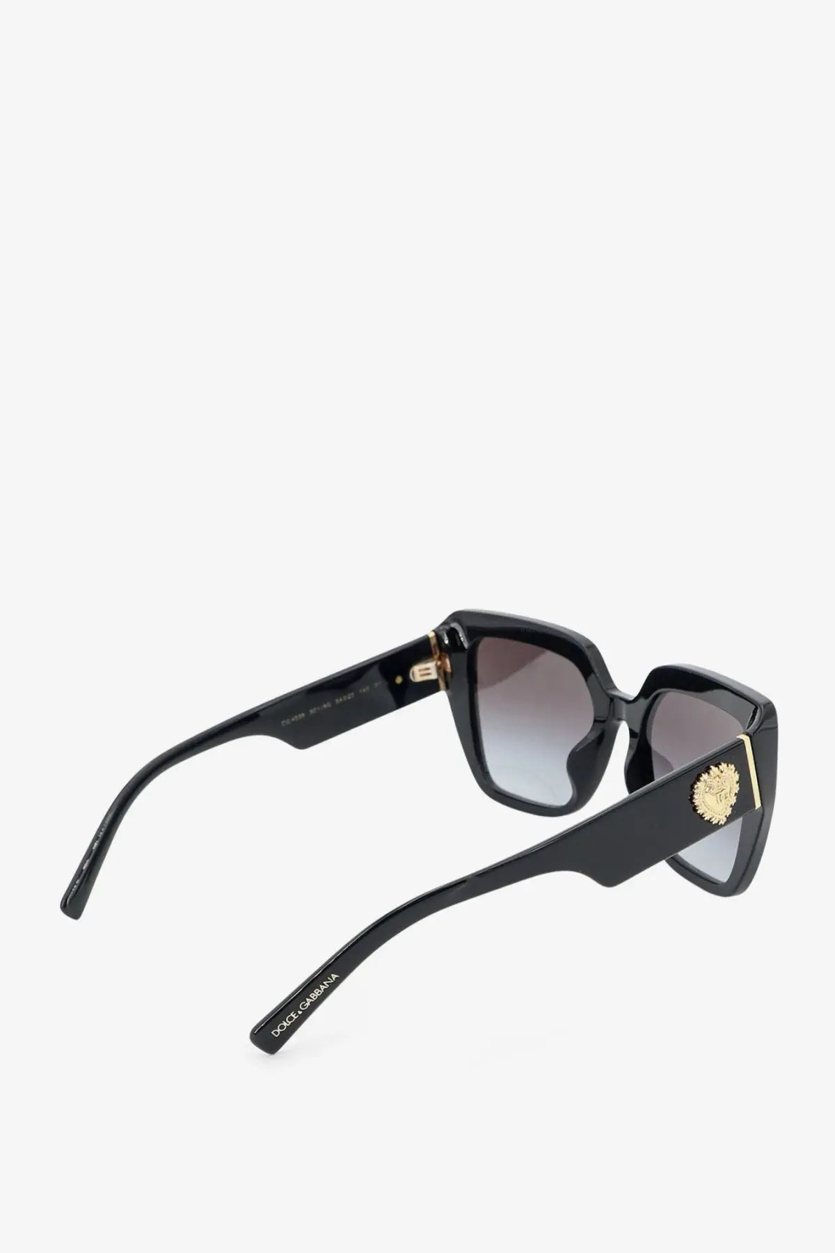 Dolce &amp; Gabbana women’s black acetate sunglasses with square frames gold-tone Medusa emblem and gradient gray lenses