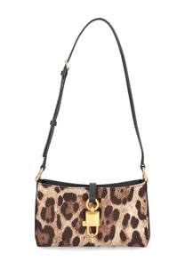 Dolce &amp; Gabbana women’s leopard print shoulder bag with gold-tone lock closure and black leather strap