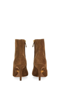 Dolce &amp; Gabbana women’s brown suede ankle boots with gold-tone zippers and ornate golden heel embellishments back view