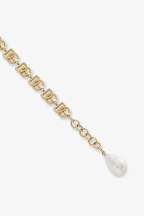 Dolce &amp; Gabbana women’s gold brass bracelet with gold-tone chain interlocking dg logo links and dangling white pearl