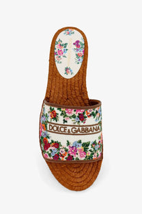 Dolce and Gabbana women’s gold espadrille slide sandal with floral embroidered white canvas strap and woven brown rope sole