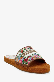 Dolce &amp; Gabbana women’s canvas espadrille slide sandal with floral pattern, woven jute sole, and brown leather trim