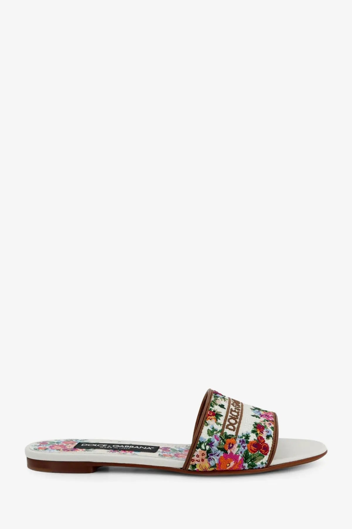 Dolce gabbana women’s canvas slide sandal with floral pattern brown leather trim and white sole in gold tones