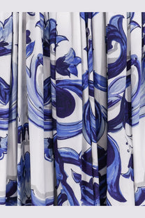Dolce &amp; gabbana women’s cotton long dress in white with bold blue and gray floral patterns in a flowing design