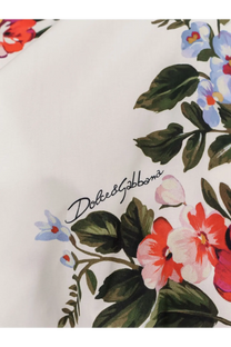 Dolce &amp; Gabbana women’s white cotton blouse with vibrant red pink and blue floral print and dark green leaves