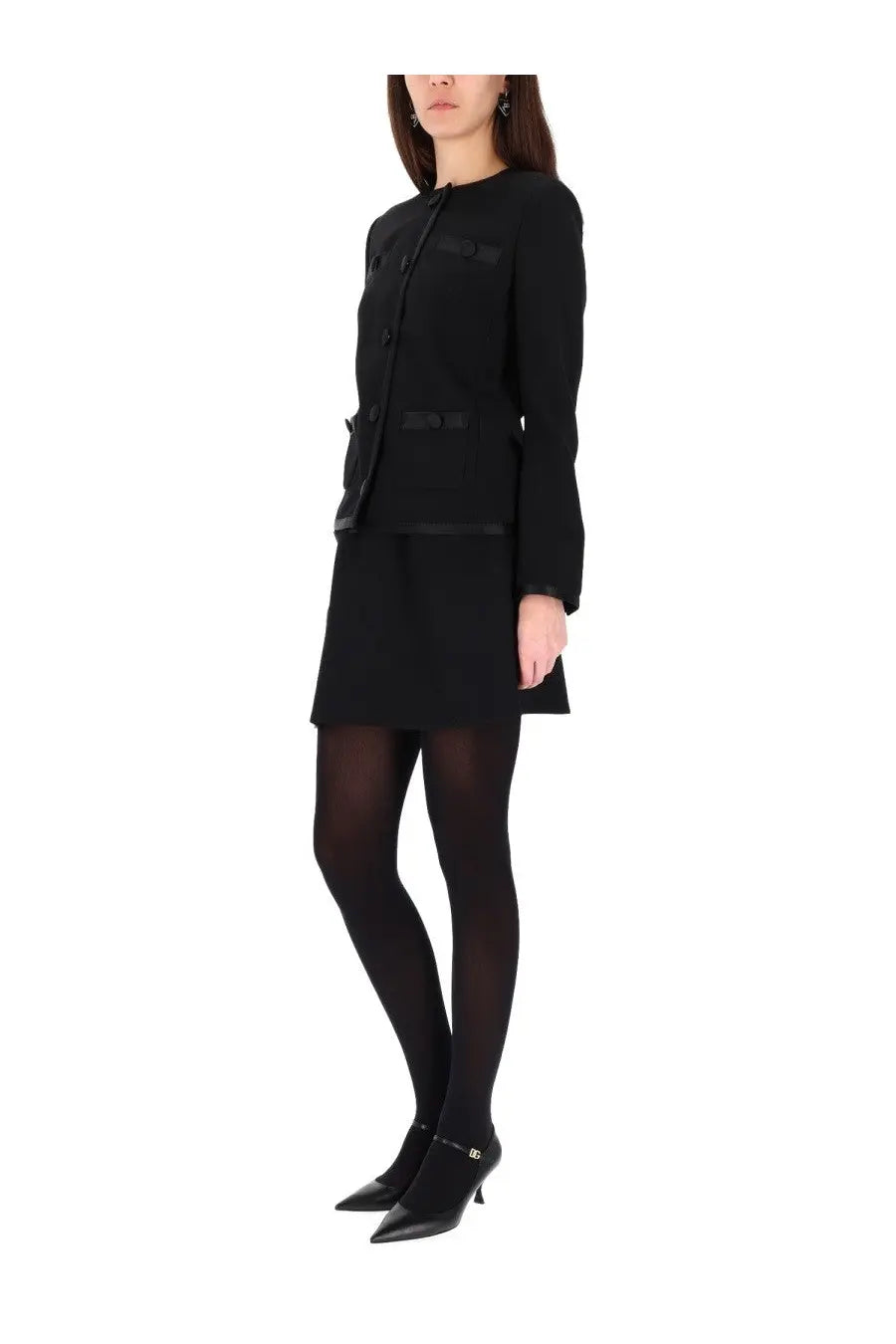 Black tailored blazer with structured shoulders and front button closure complementing dolce &amp; gabbana skirt