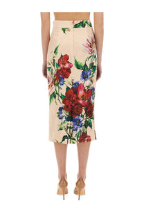 Dolce &amp; Gabbana women’s beige floral midi pencil skirt with vibrant red blue and pink blossoms on satin fabric